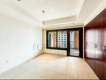 2 Bedrooms  Apartment  For Rent  in Doha -  The Pearl  Not Furnished