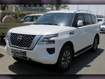 Nissan  Patrol  SE  2023  Automatic  12,000 Km  6 Cylinder  Four Wheel Drive (4WD)  SUV  White  With Warranty