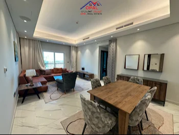 2 Bedrooms  Apartment  For Rent  in Doha -  The Pearl  Fully Furnished