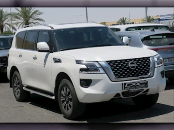 Nissan  Patrol  SE  2023  Automatic  12,000 Km  6 Cylinder  Four Wheel Drive (4WD)  SUV  White  With Warranty