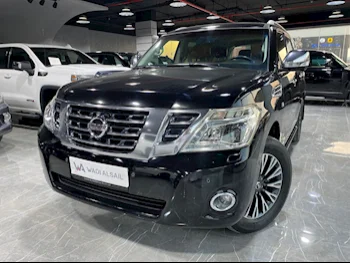 Nissan  Patrol  Platinum  2014  Automatic  252,000 Km  8 Cylinder  Four Wheel Drive (4WD)  SUV  Black