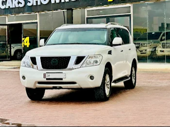 Nissan  Patrol  Platinum  2012  Automatic  321,000 Km  8 Cylinder  Four Wheel Drive (4WD)  SUV  White