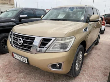 Nissan  Patrol  SE  2016  Automatic  261,000 Km  8 Cylinder  Four Wheel Drive (4WD)  SUV  Gold