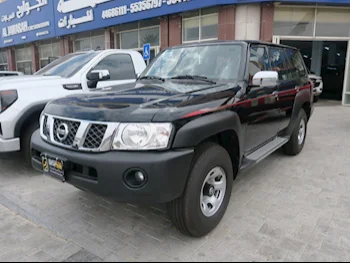 Nissan  Patrol  Safari  2021  Manual  47,000 Km  6 Cylinder  Four Wheel Drive (4WD)  SUV  Black  With Warranty