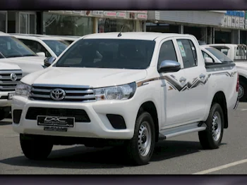 Toyota  Hilux  2024  Automatic  3,000 Km  4 Cylinder  Four Wheel Drive (4WD)  Pick Up  White  With Warranty