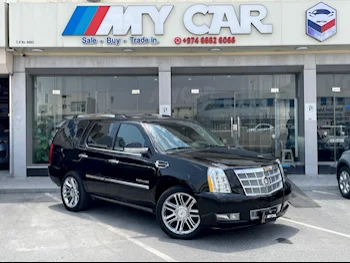 Cadillac  Escalade  2011  Automatic  95,000 Km  8 Cylinder  Four Wheel Drive (4WD)  SUV  Black