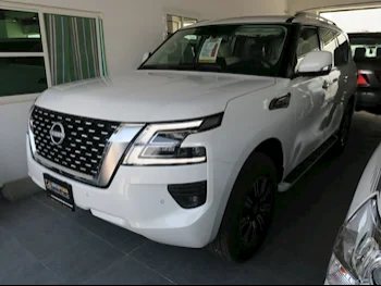 Nissan  Patrol  SE  2023  Automatic  0 Km  6 Cylinder  Four Wheel Drive (4WD)  SUV  White  With Warranty