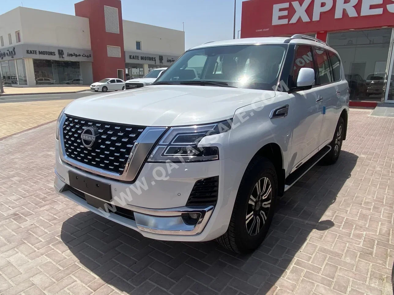 Nissan  Patrol  Titanium  2023  Automatic  0 Km  6 Cylinder  Four Wheel Drive (4WD)  SUV  White  With Warranty