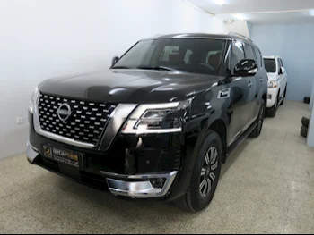 Nissan  Patrol  Titanium  2024  Automatic  16,000 Km  6 Cylinder  Four Wheel Drive (4WD)  SUV  Black  With Warranty