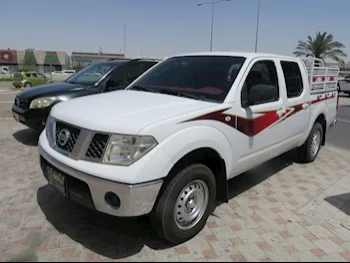 Nissan  Navara  2013  Manual  246,000 Km  4 Cylinder  Rear Wheel Drive (RWD)  Pick Up  White