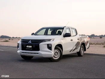 Mitsubishi  L 200  2019  Manual  132,000 Km  4 Cylinder  Rear Wheel Drive (RWD)  Pick Up  White