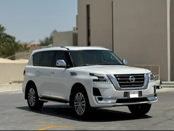 Nissan  Patrol  Platinum  2020  Automatic  62,000 Km  6 Cylinder  Four Wheel Drive (4WD)  SUV  White