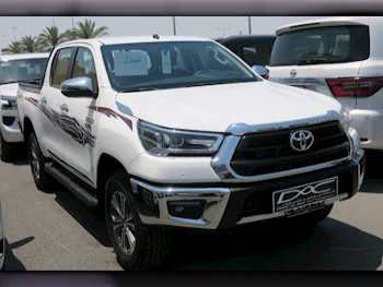 Toyota  Hilux  2024  Automatic  0 Km  4 Cylinder  Four Wheel Drive (4WD)  Pick Up  White  With Warranty