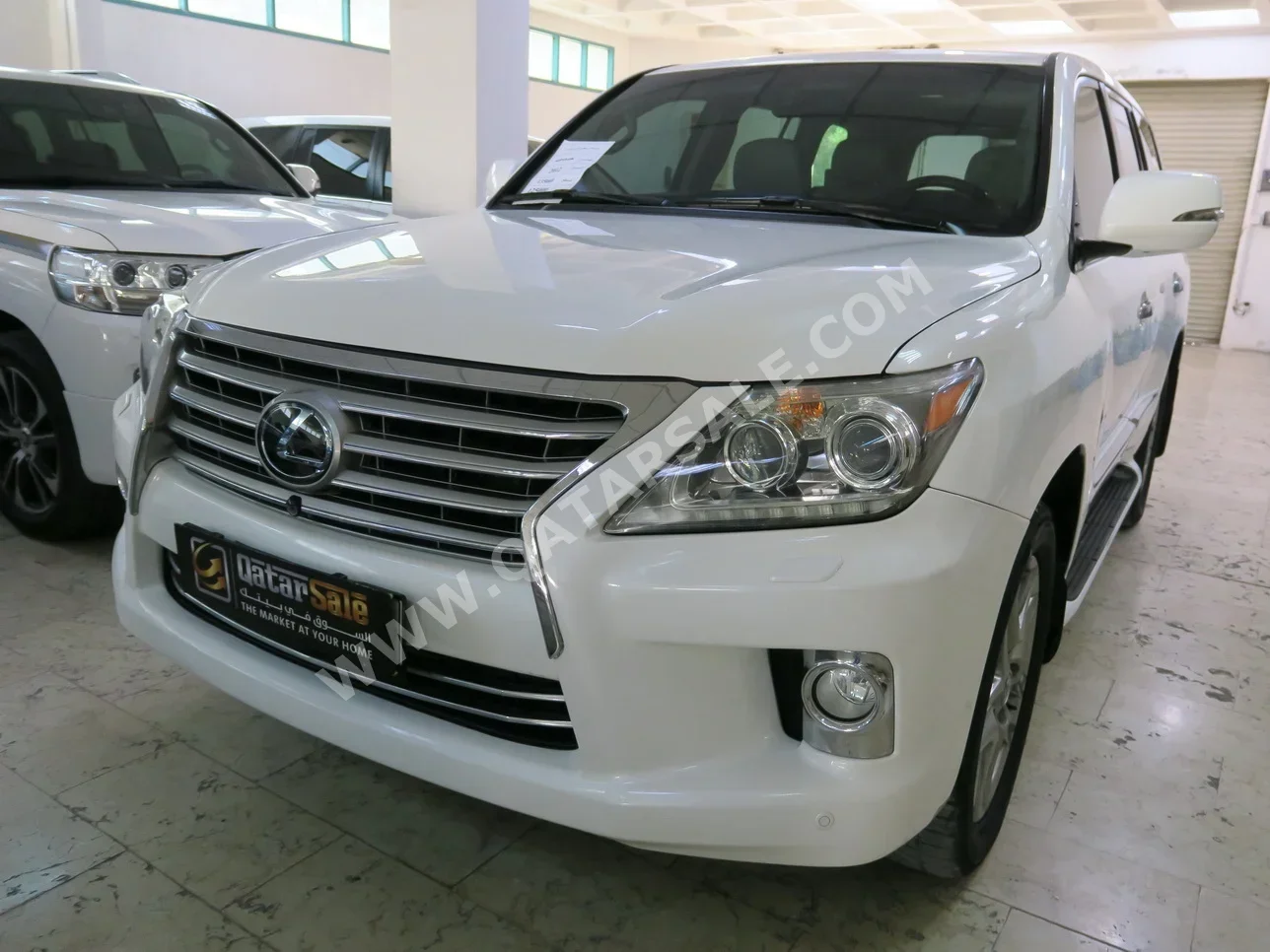  Lexus  LX  570  2012  Automatic  135,000 Km  8 Cylinder  Four Wheel Drive (4WD)  SUV  White  With Warranty