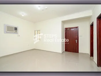 2 Bedrooms  Apartment  For Rent  in Doha -  Al Mansoura  Not Furnished