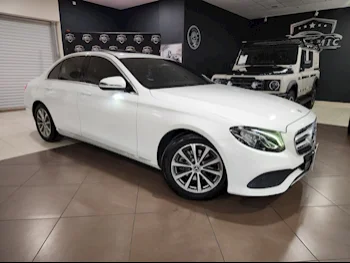 Mercedes-Benz  E-Class  200  2018  Automatic  85,000 Km  4 Cylinder  Rear Wheel Drive (RWD)  Sedan  White