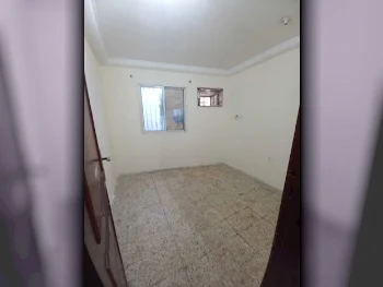 2 Bedrooms  Apartment  For Rent  in Doha -  Old Airport  Not Furnished