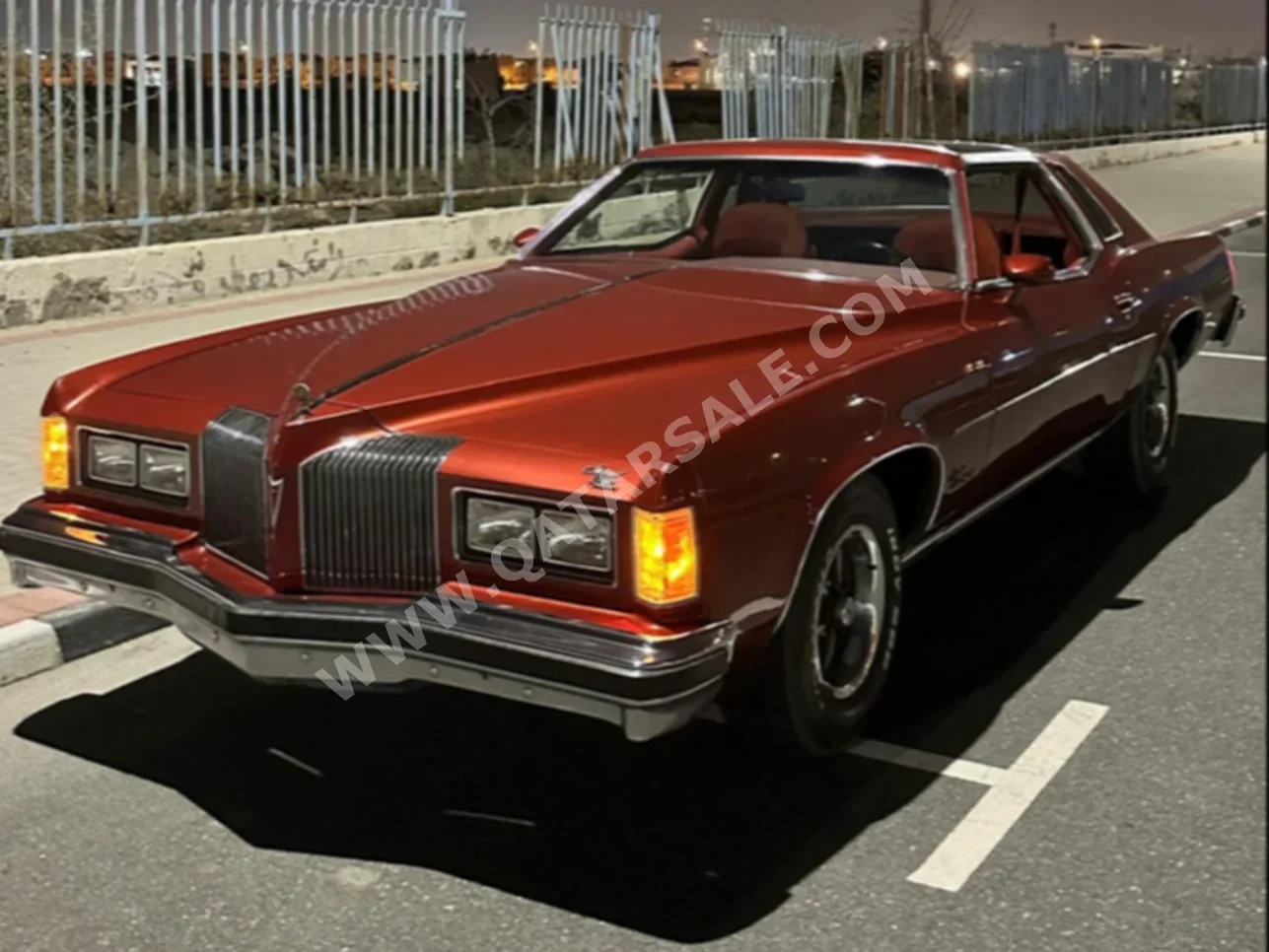 Pontiac  Grand Prix  1976  Automatic  470,182 Km  8 Cylinder  Rear Wheel Drive (RWD)  Classic  Orange