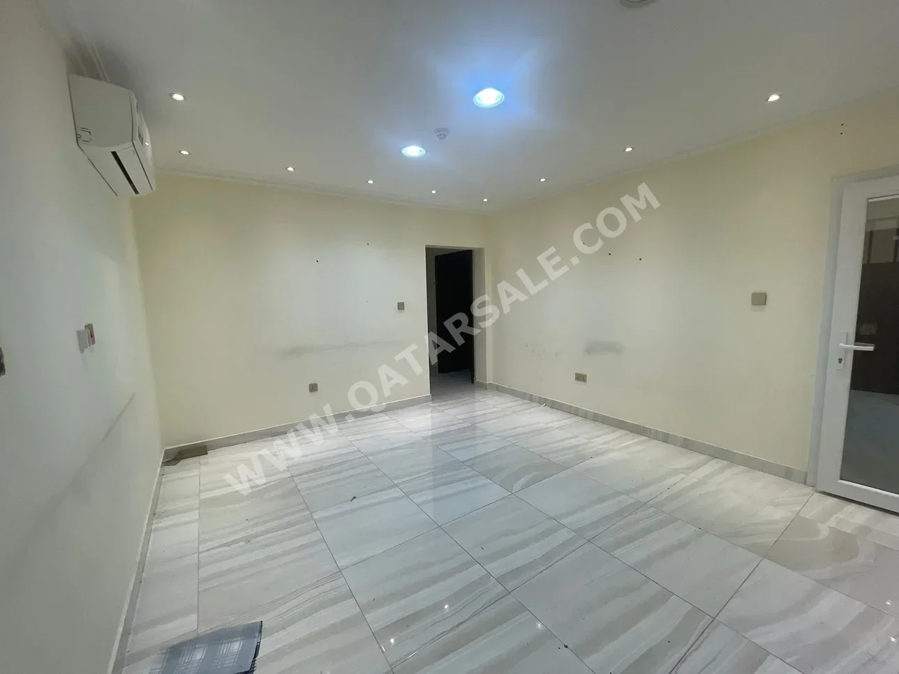 2 Bedrooms  Apartment  For Rent  in Doha -  Al Mansoura  Not Furnished