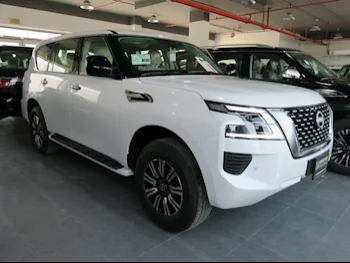 Nissan  Patrol  SE  2024  Automatic  0 Km  6 Cylinder  Four Wheel Drive (4WD)  SUV  White  With Warranty