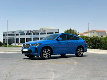 BMW  X-Series  X4  2022  Automatic  14٬000 Km  4 Cylinder  Four Wheel Drive (4WD)  SUV  Blue  With Warranty