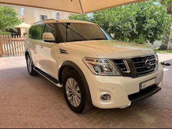 Nissan  Patrol  Titanium  2018  Automatic  53,000 Km  8 Cylinder  Four Wheel Drive (4WD)  SUV  White  With Warranty