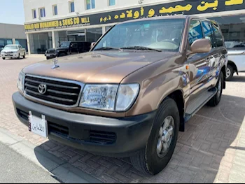  Toyota  Land Cruiser  GX  2002  Manual  600,000 Km  6 Cylinder  Four Wheel Drive (4WD)  SUV  Brown  With Warranty