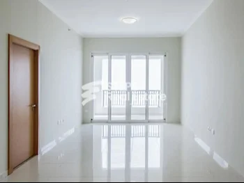 2 Bedrooms  Apartment  For Rent  in Doha -  The Pearl  Semi Furnished