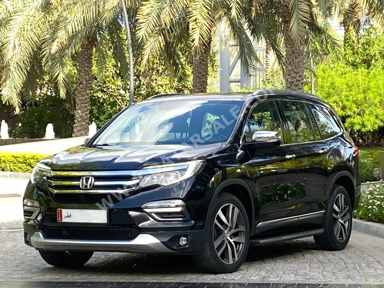 Honda  Pilot  Touring  2016  Automatic  70,000 Km  6 Cylinder  All Wheel Drive (AWD)  SUV  Black