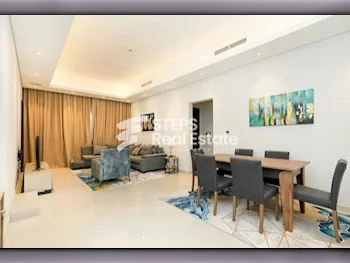 2 Bedrooms  Apartment  For Rent  in Doha -  The Pearl  Fully Furnished