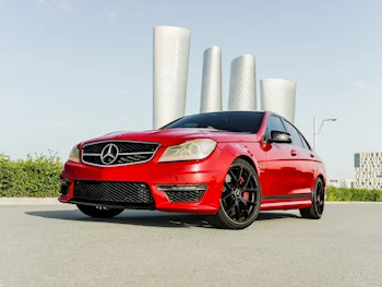 مرسيدس - بنز  سي - كلاس  63 AMG  2014  اوتوماتيك  168,000 كم  8 سلندر  دفع خلفي  سيدان  أحمر