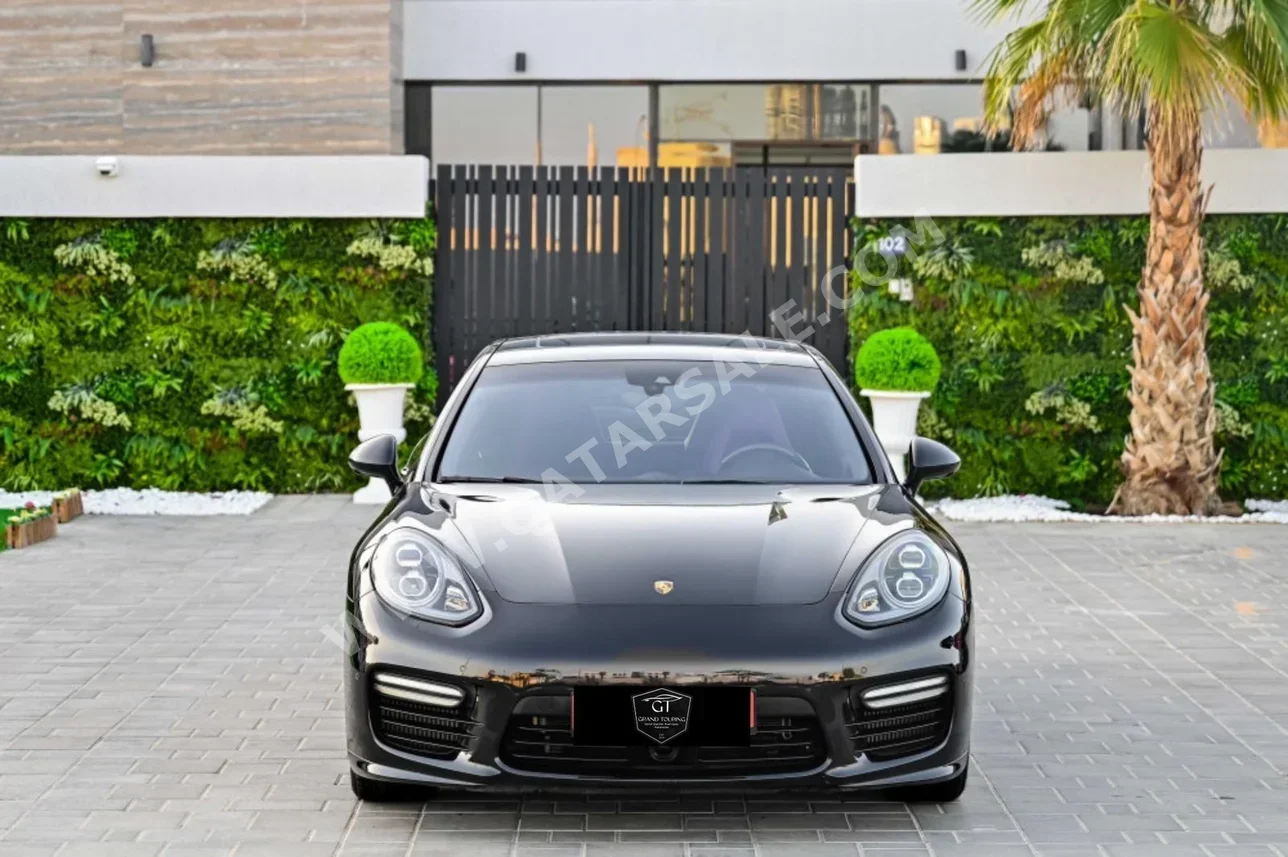 Porsche  Panamera  2014  Automatic  60,000 Km  8 Cylinder  Rear Wheel Drive (RWD)  Sedan  Black