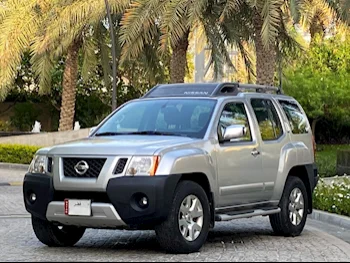 Nissan  Xterra  SE  2014  Automatic  91,000 Km  6 Cylinder  Four Wheel Drive (4WD)  SUV  Silver