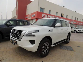 Nissan  Patrol  SE  2024  Automatic  0 Km  6 Cylinder  Four Wheel Drive (4WD)  SUV  White  With Warranty