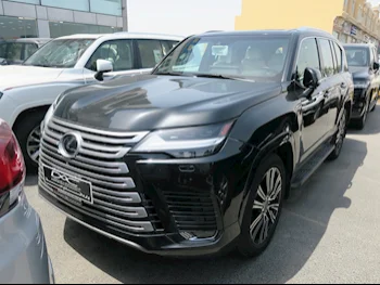 Lexus  LX  600 Luxury  2022  Automatic  70,000 Km  6 Cylinder  Four Wheel Drive (4WD)  SUV  Black  With Warranty