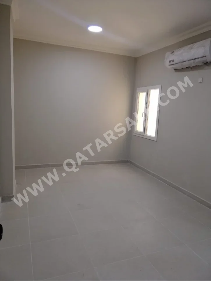 3 Bedrooms  Apartment  For Rent  in Doha -  Al Mansoura  Not Furnished