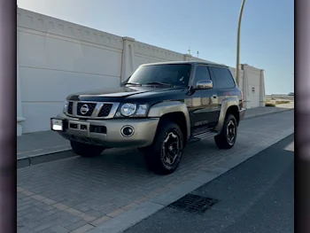 Nissan  Patrol  Super Safari  2021  Manual  31,000 Km  6 Cylinder  Four Wheel Drive (4WD)  SUV  Black  With Warranty