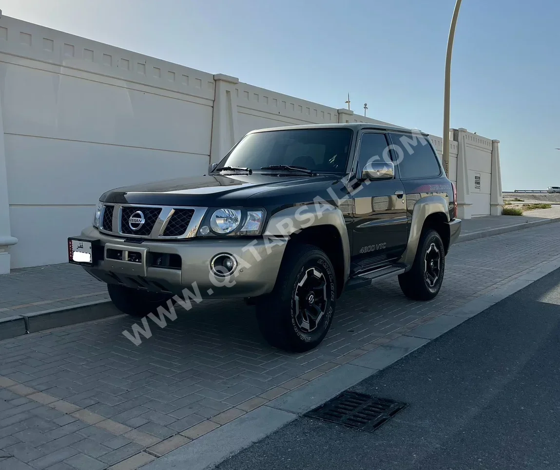 Nissan  Patrol  Super Safari  2021  Manual  31,000 Km  6 Cylinder  Four Wheel Drive (4WD)  SUV  Black  With Warranty