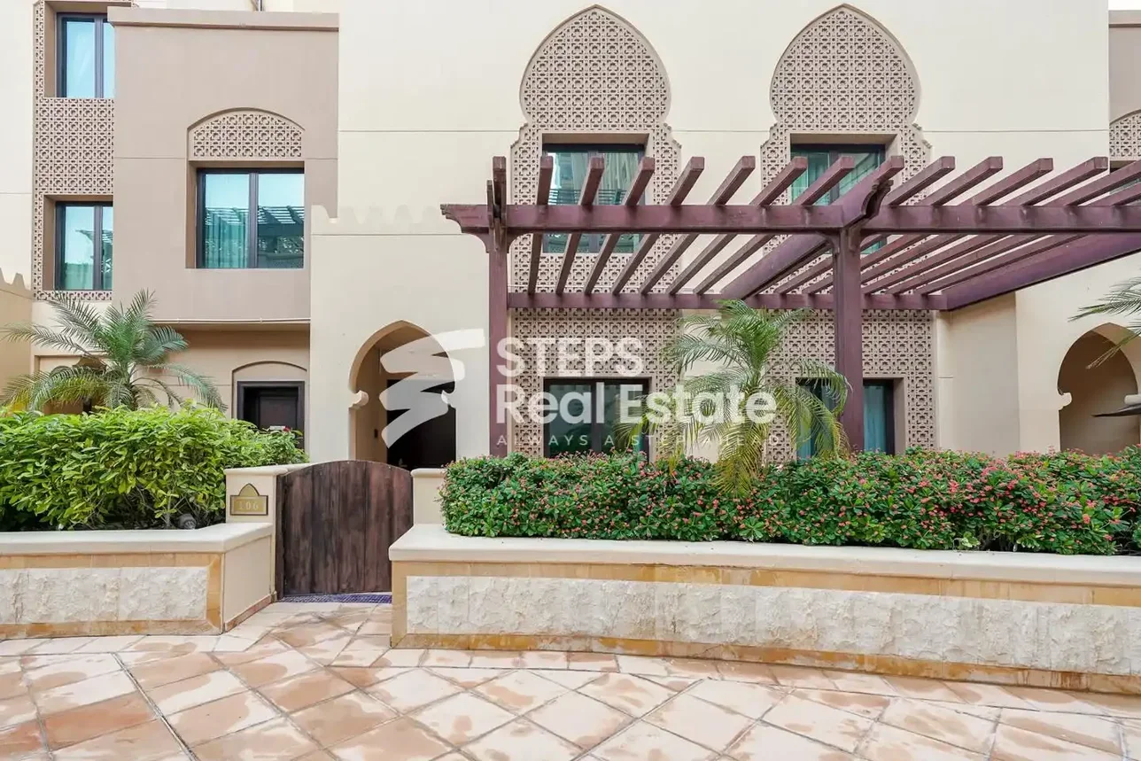 4 Bedrooms  Apartment  For Rent  in Doha -  The Pearl  Semi Furnished