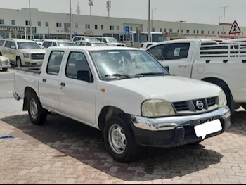 Nissan  Pickup  2016  Manual  153,000 Km  4 Cylinder  Rear Wheel Drive (RWD)  Pick Up  White