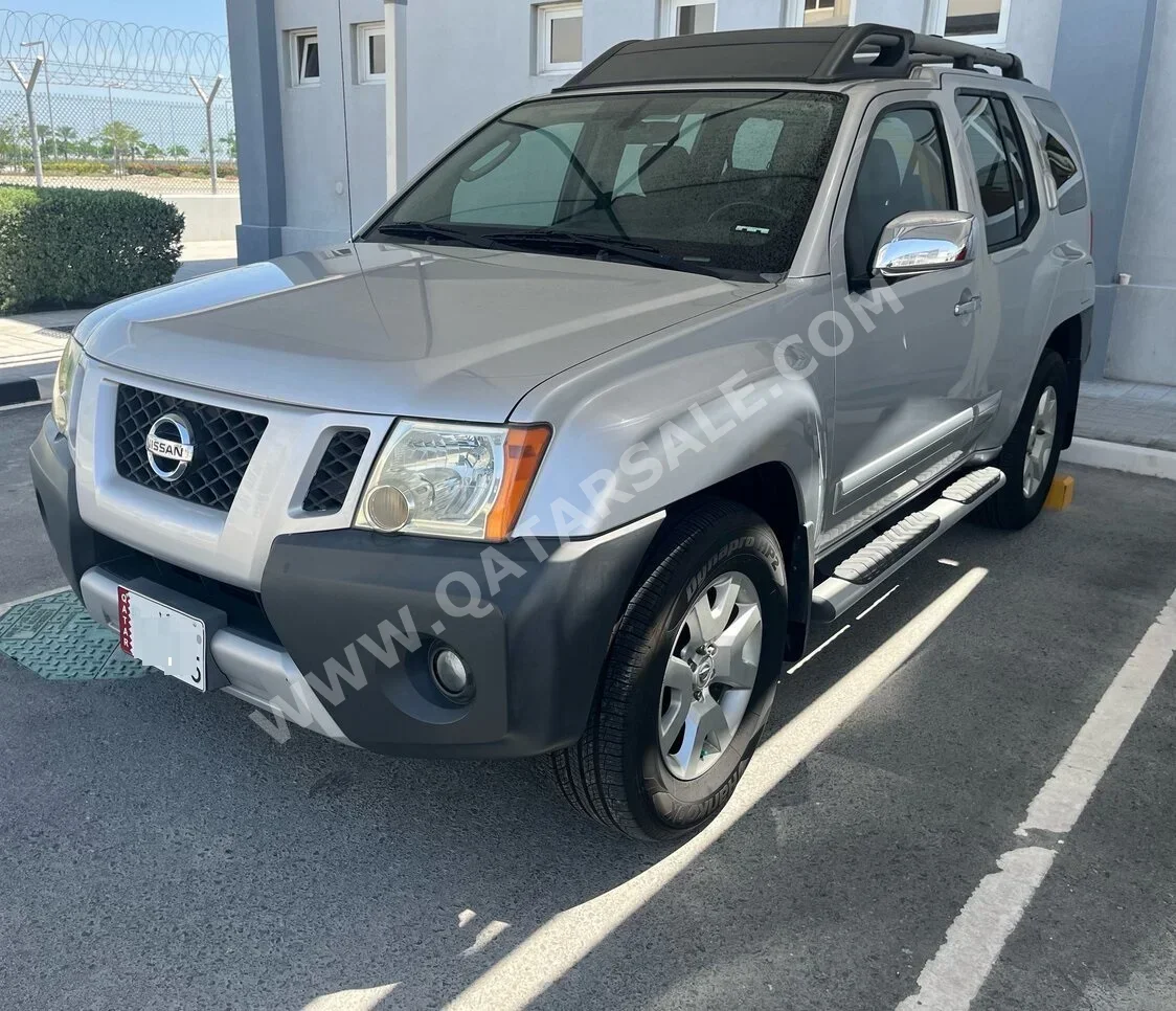 Nissan  Xterra  SE  2011  Automatic  215,000 Km  6 Cylinder  Four Wheel Drive (4WD)  SUV  Gray