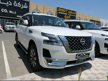 Nissan  Patrol  Titanium  2024  Automatic  0 Km  6 Cylinder  Four Wheel Drive (4WD)  SUV  White  With Warranty