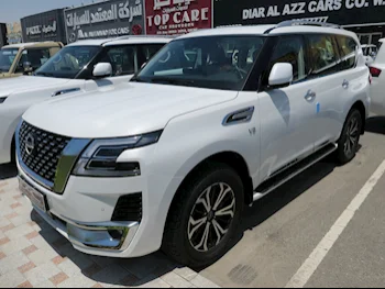 Nissan  Patrol  Titanium  2023  Automatic  0 Km  8 Cylinder  Four Wheel Drive (4WD)  SUV  White  With Warranty