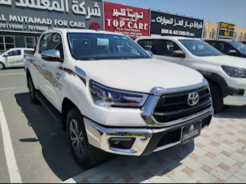 Toyota  Hilux  2024  Automatic  0 Km  4 Cylinder  Four Wheel Drive (4WD)  Pick Up  White  With Warranty