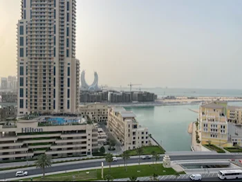 3 Bedrooms  Apartment  For Sale  in Doha -  The Pearl  Semi Furnished