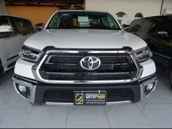 Toyota  Hilux  2022  Automatic  0 Km  4 Cylinder  Four Wheel Drive (4WD)  Pick Up  White  With Warranty