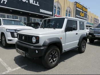 Suzuki  Jimny  2023  Automatic  12,000 Km  4 Cylinder  Four Wheel Drive (4WD)  SUV  White  With Warranty