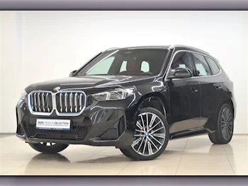 BMW  IX  1  2023  Automatic  7,960 Km  0 Cylinder  All Wheel Drive (AWD)  SUV  Black  With Warranty