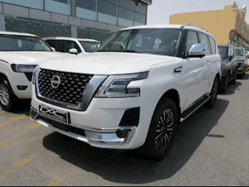 Nissan  Patrol  Platinum  2023  Automatic  0 Km  6 Cylinder  Four Wheel Drive (4WD)  SUV  White  With Warranty