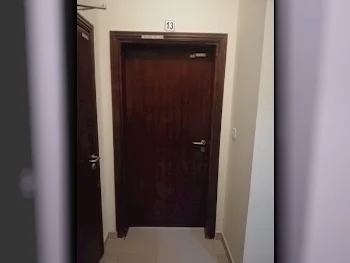 2 Bedrooms  Apartment  For Rent  in Doha -  Madinat Khalifa South  Not Furnished